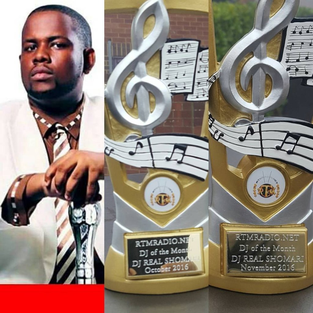 DJ Real Shomari with two RTMRADIO.NET DJ of the Month trophies, October and November 2016