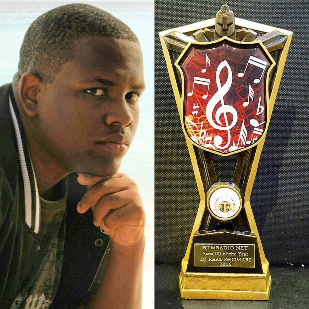 DJ Real Shomari with his RTMRADIO.NET Fans' DJ of the Year 2016 trophy