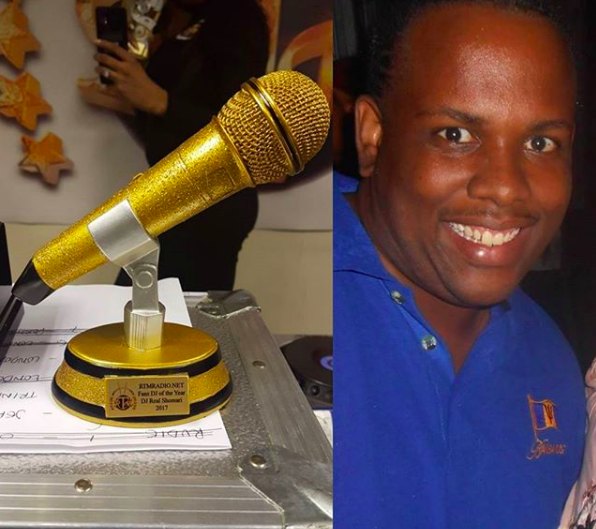 DJ Real Shomari and his RTMRADIO.NET Fans' DJ of the Year 2017 gold microphone trophy